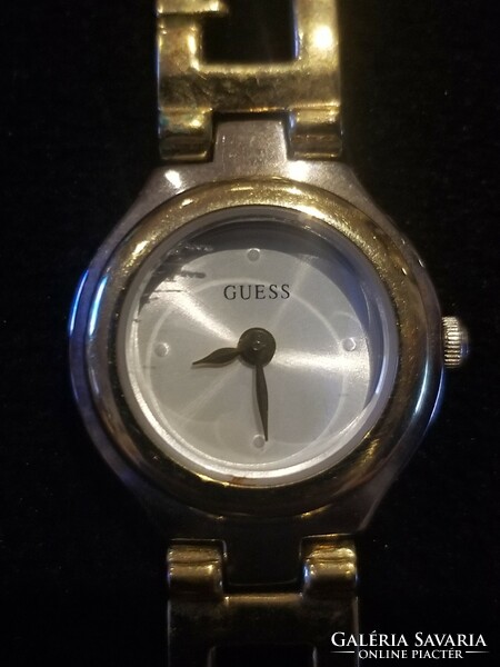Vintage guess women's watch with gold tone dial and Japan movement