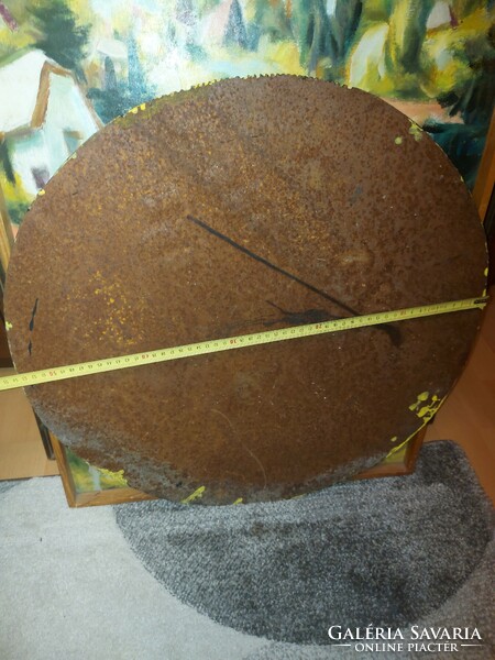 54 cm diameter, thick, circular iron plate, cut around with a flame cutter, several kilos