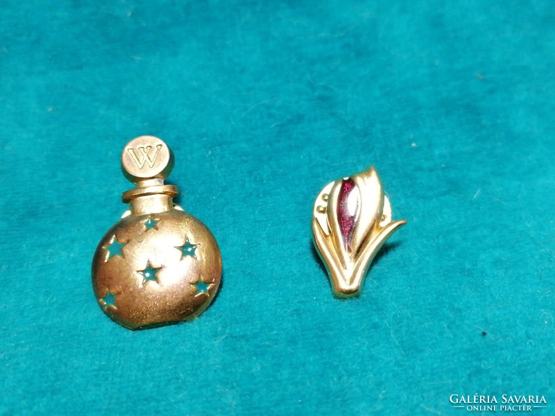 Perfume bottle and flower pin, 