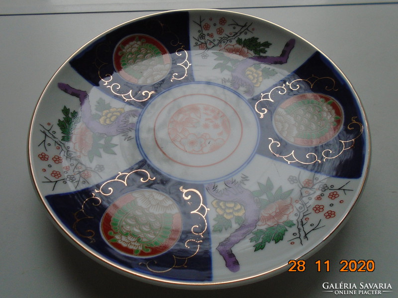 1912-1926 Taisho period Imari Japanese bowl with prunus and fish scale patterns intaglio
