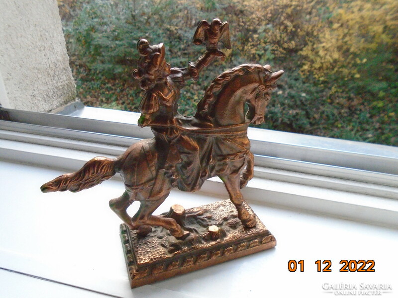 Equestrian falconry statue