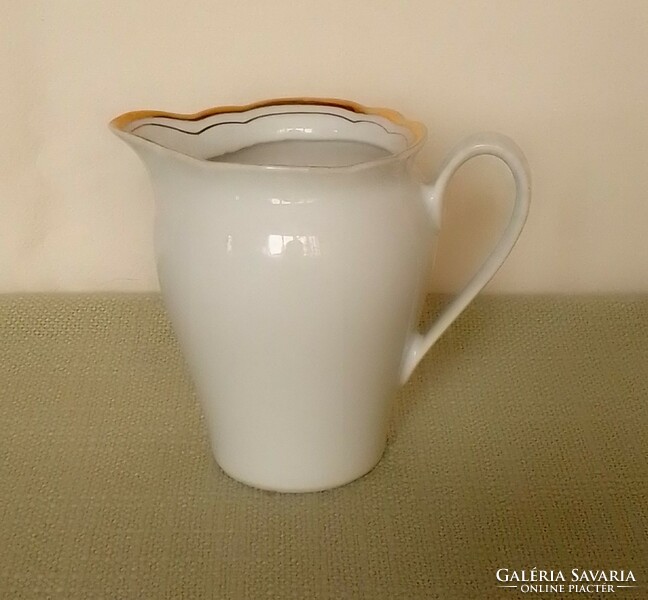 Kahla white porcelain pouring pitcher with creamy milky gold border