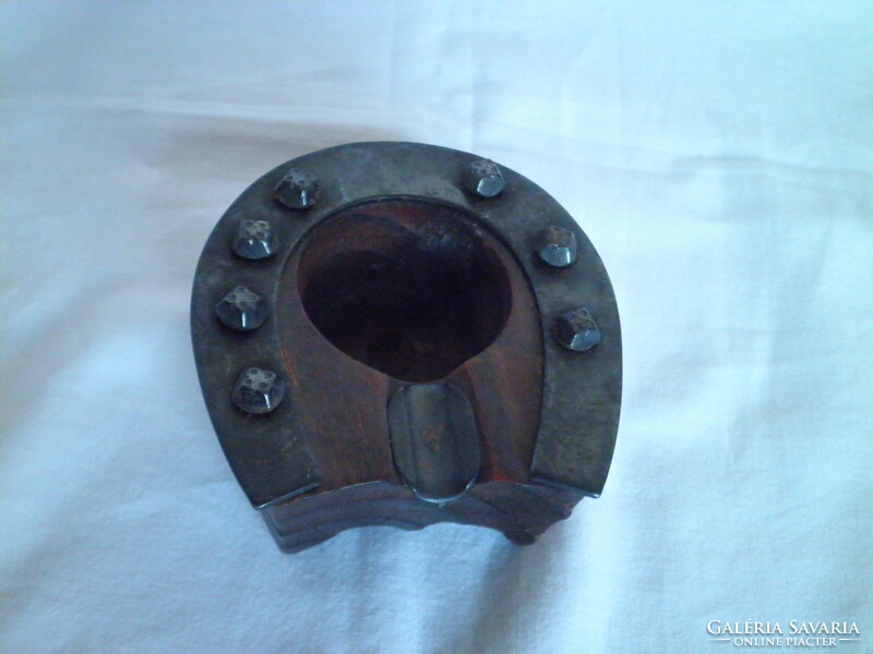 Horseshoe shaped ashtray