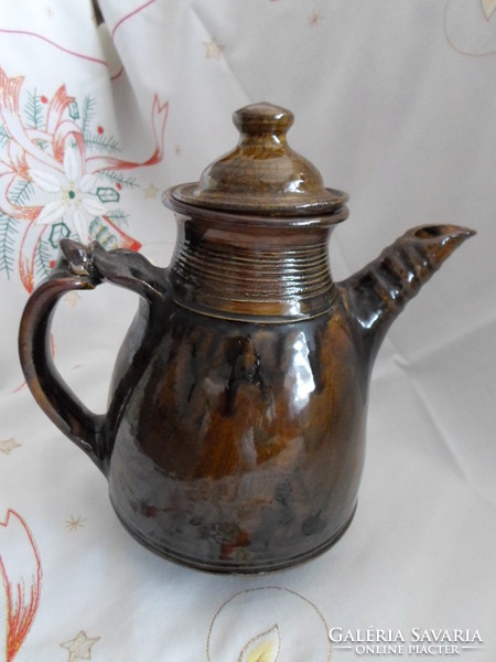 Folk handicraft glazed ceramic teapot