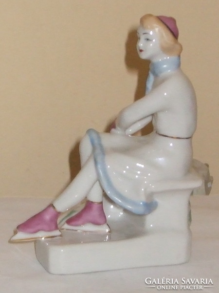 Russian porcelain ballerina preparing to skate