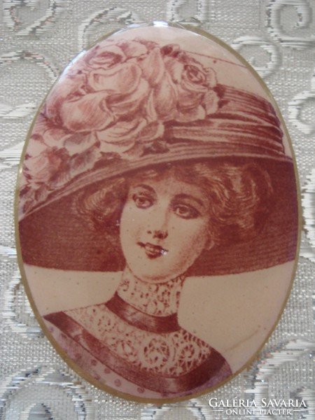 Old women's brooch with vintage badge