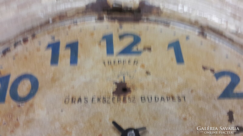 Old clock jewel metal wall clock with trepper sign