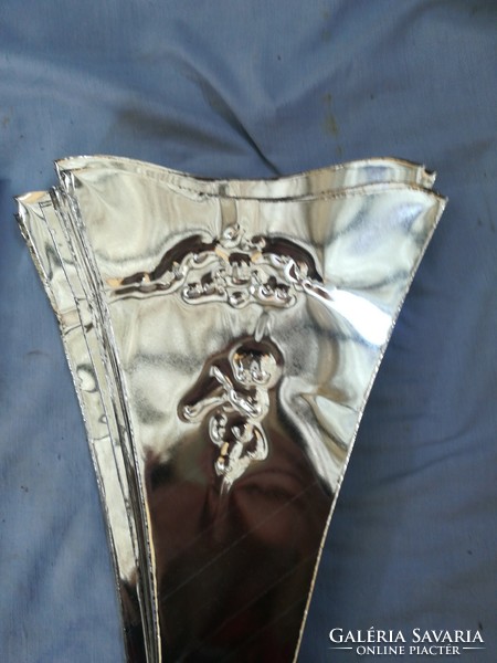 Metal plates with angelic pressed decoration