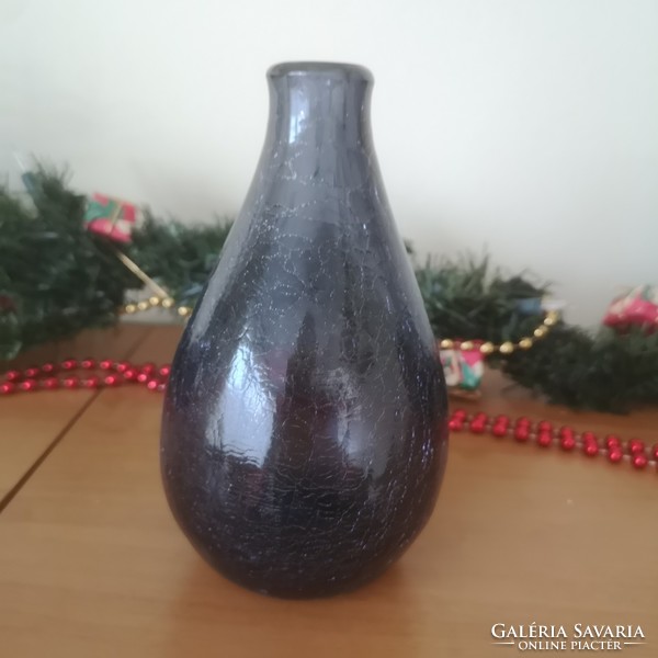 Veil glass in a bluish purple vase