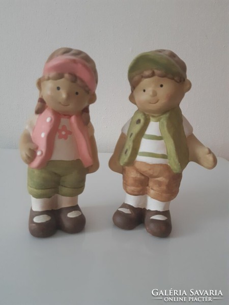 Ceramic figurines (girl and boy)