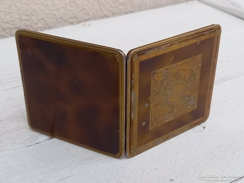 Old, brass-coated powder box with frosted mirror insert