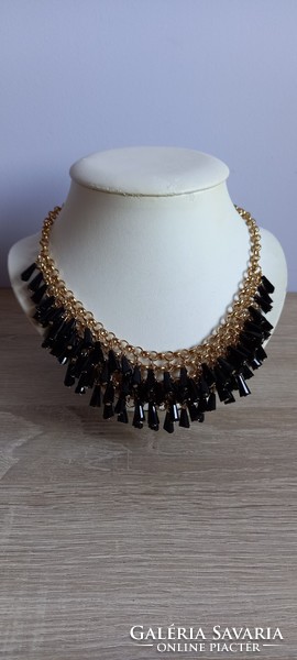 Necklace decorated with black crystals
