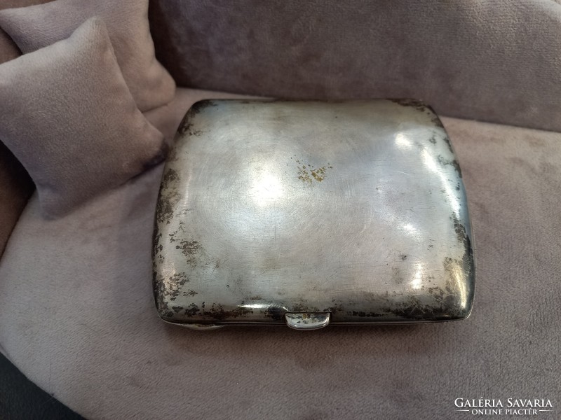 Antique silver cigarette case with fire enamel