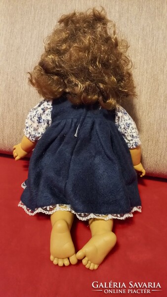 Character doll, 40 cm, soft stuffed body, hard plastic head and limbs, abundant combable hair.