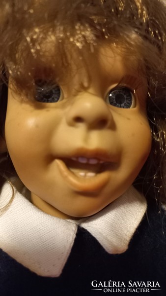 Character doll, 40 cm, soft stuffed body, hard plastic head and limbs, abundant combable hair.