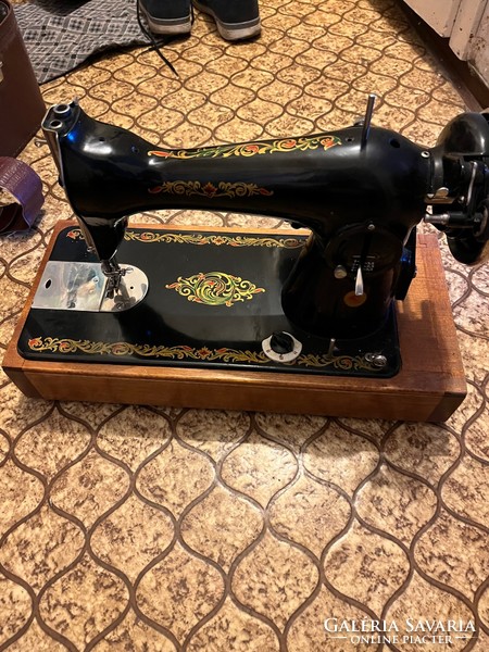 Russian electric sewing machine for sale in its original box with all accessories