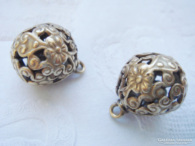 Pair of old female vintage clothes buttons with metal buttons