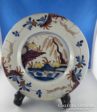Around 1750 delfts aardewerk - old earthenware plate with landscape painted in several colors