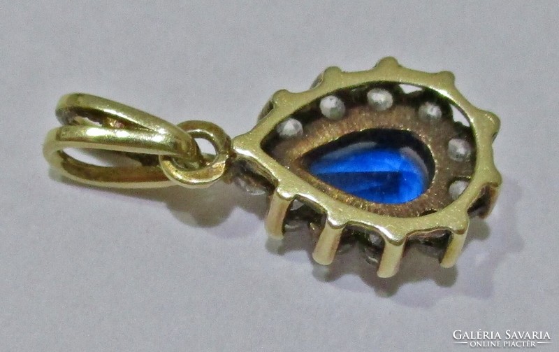 Nice 14kt gold pendant with sapphire and zircon