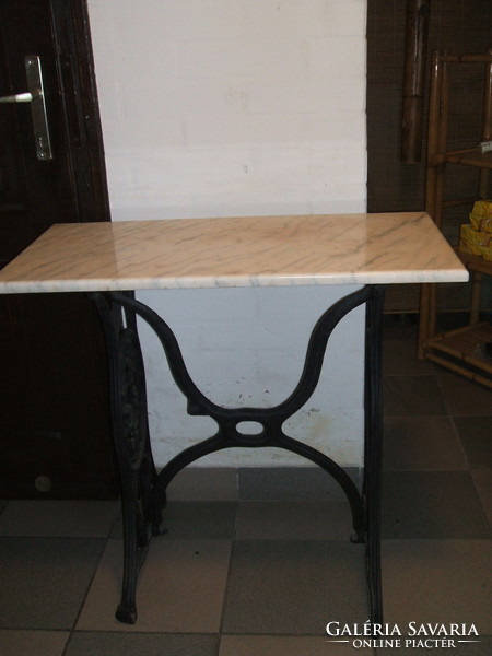 Console table made of antique sewing machine legs