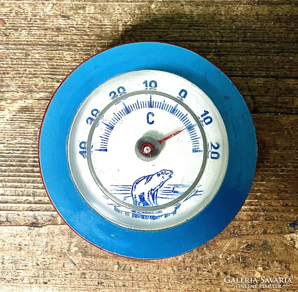 Retro, space age flying saucer cooling thermometer