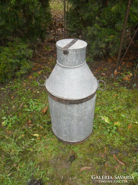 Old large galvanized milk or water jug
