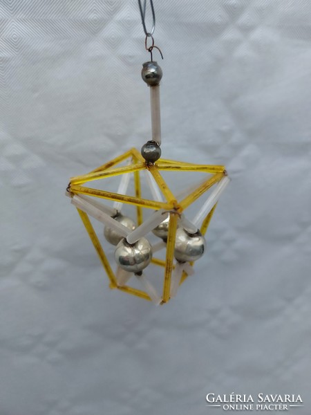 Old glass geometric Christmas tree ornament with yellow lantern glass ornament