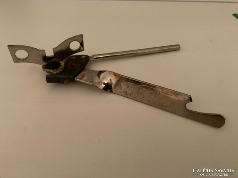Old retro metal can opener - with probus made in England print
