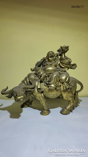 Oriental antique copper statue of Laozi (lao ce) sitting on a bull