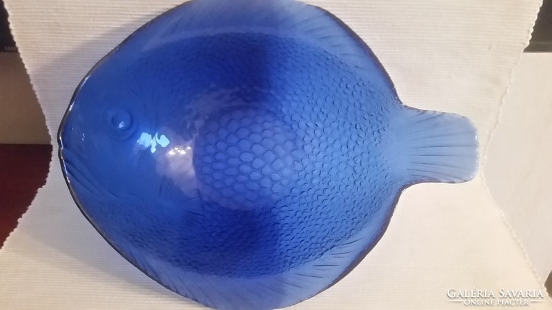 A beautiful fish-shaped deep serving bowl made of blue glass
