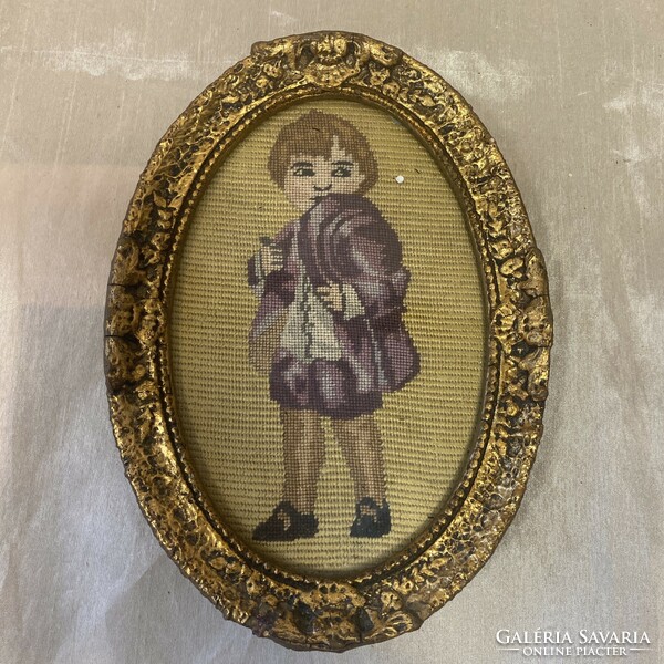 Small antique frame with needle tapestry