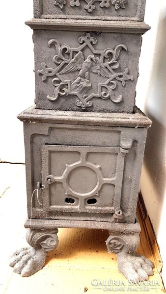 Antique 1870s hunting-scene two-story cast iron stove