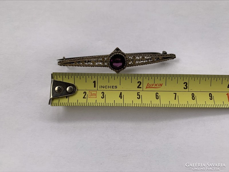 Antique silver-plated copper brooch with purple stone