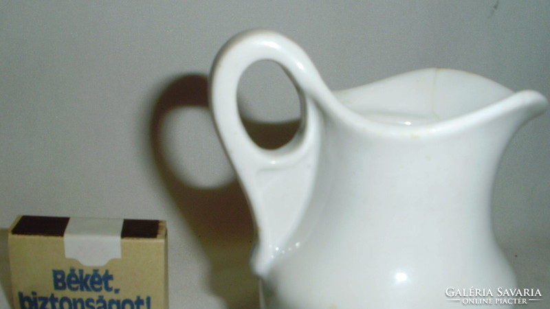 Antique, thick-walled porcelain milk spout, small jug