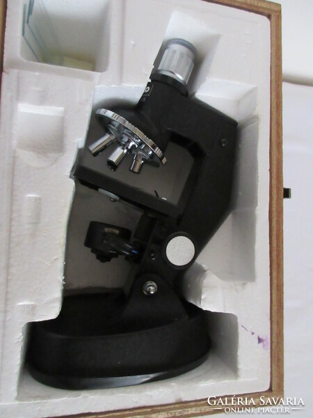 Old, marked, German microscope, together with its accessories. Negotiable!