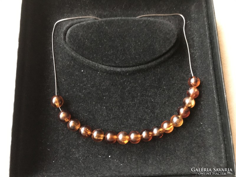 Silver necklace with amber beads