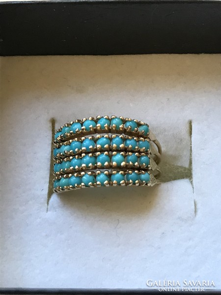 Yellow gold ring with turquoise stones