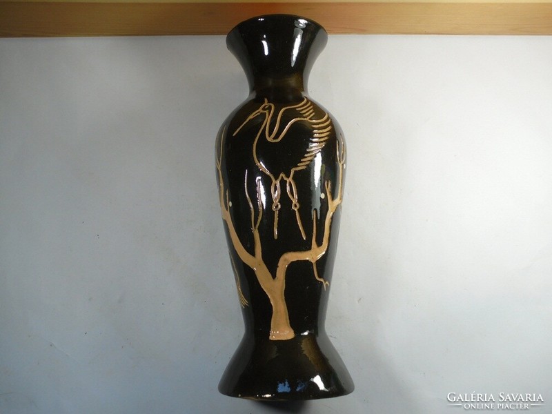 Retro régi mázas kerámia váza gólya ábrázolással