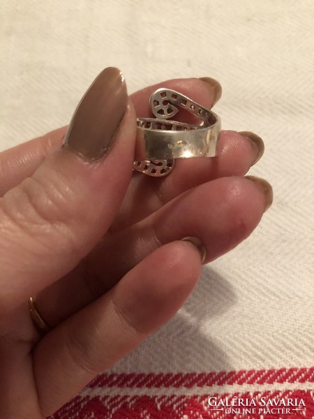 Silver ring decorated with stones