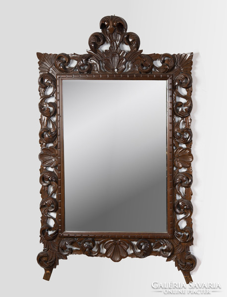 Old carved wooden framed mirror