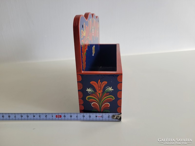 Retro old folk motif painted wall holder with small wall shelf for tourist souvenir