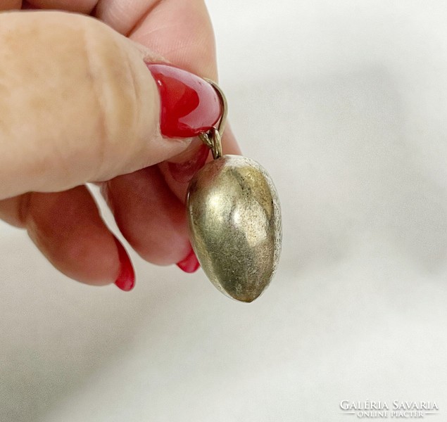 Heart-shaped silver pendant