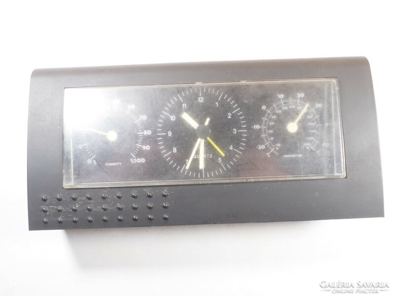 Retro old clock quartz humidity meter thermometer - approx. It has been operating since the 1990s