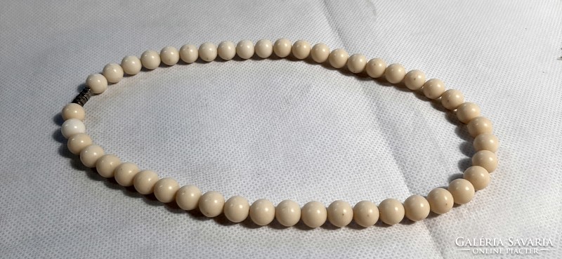 Vintage bone effect plastic string of beads