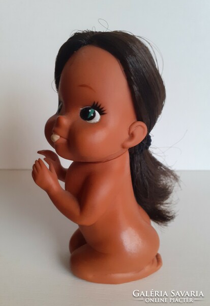 Old rare gesturing rubber doll with braided hair