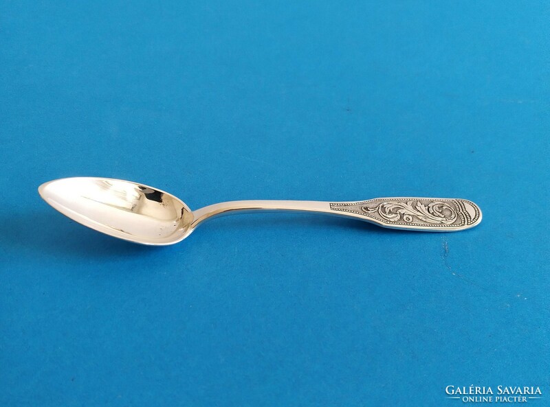 Engraved silver tea spoon