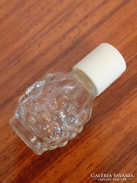 Old mini cologne bottle with vintage perfume raspberry shaped vial bottle