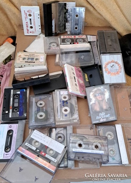24 cassette tapes with mixed content.