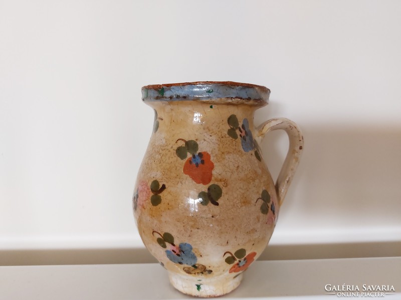 Old glazed tile jar with floral folk little jam bastard
