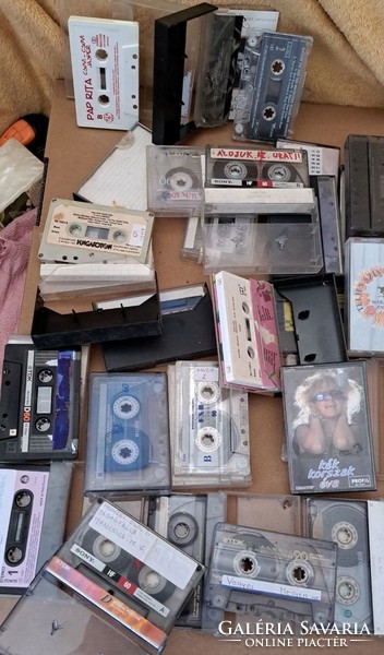 24 cassette tapes with mixed content.
